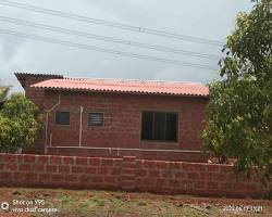 Concrete roofing sheets house